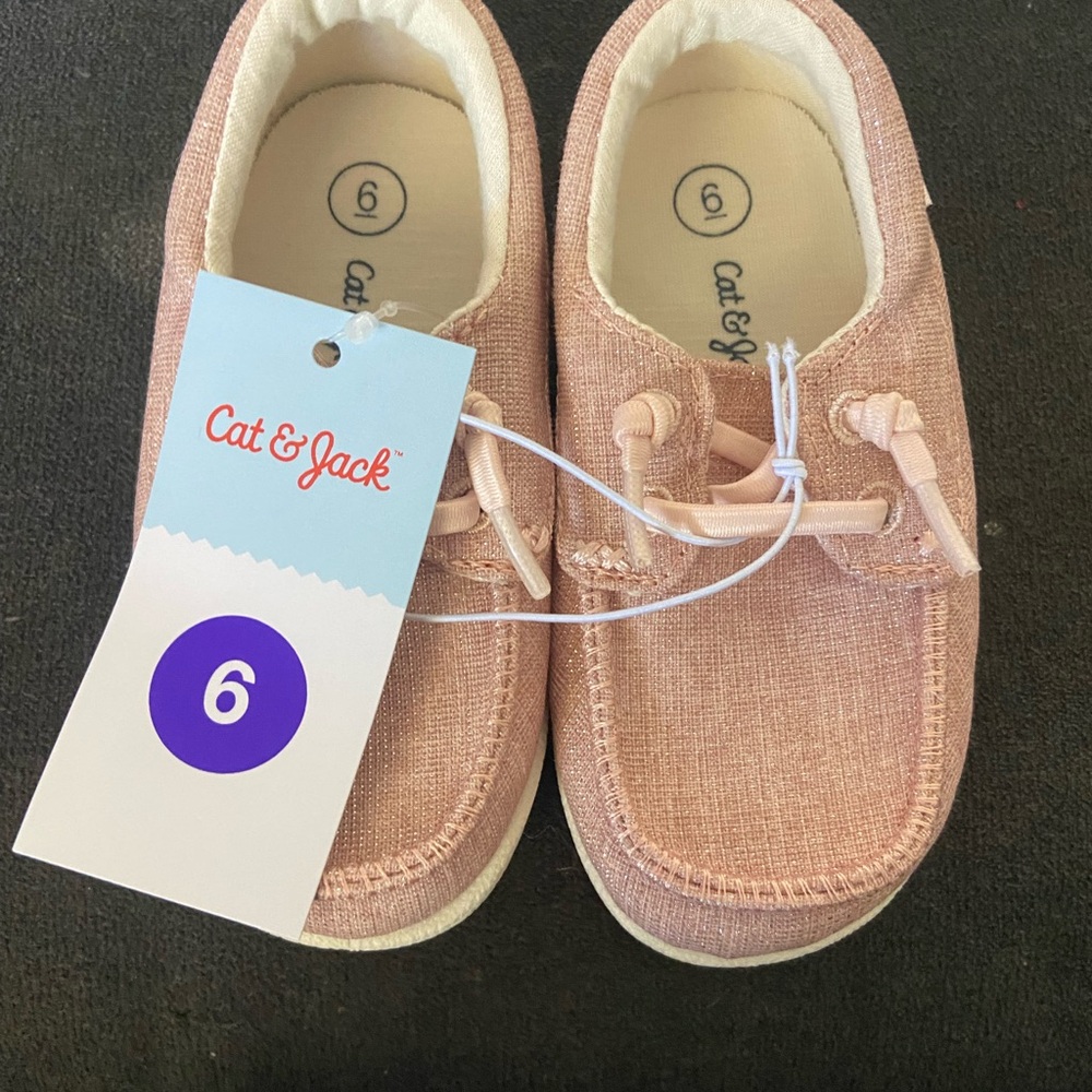 Little girl super cute pink sparkly shoes
